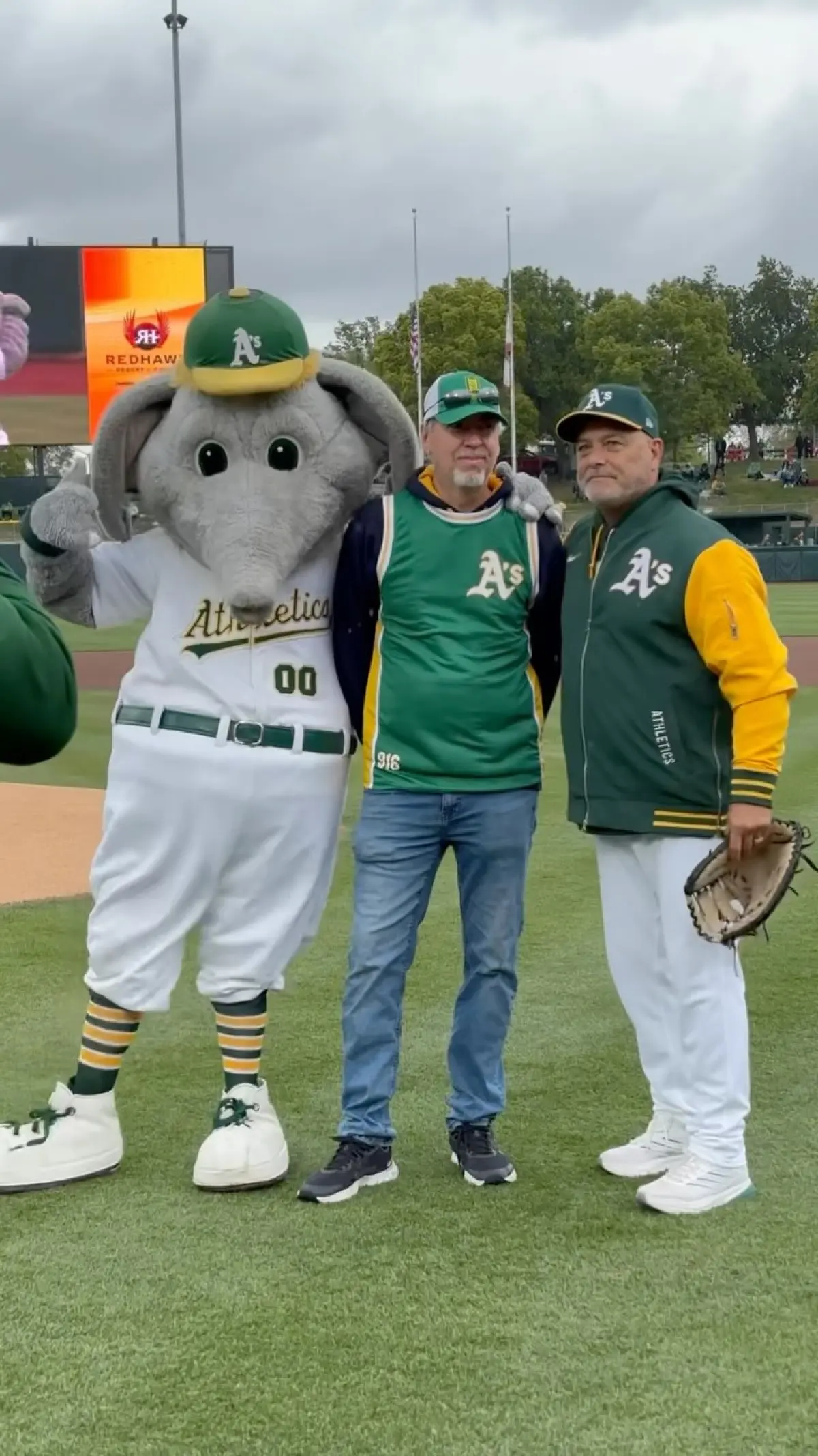 Local resort representative takes the mound for A's game day honor at the Oakland Coliseum.