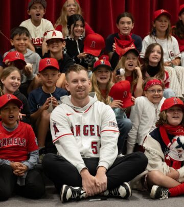 Zeferjahn and McDaniels connect with elementary students in community outreach initiative.