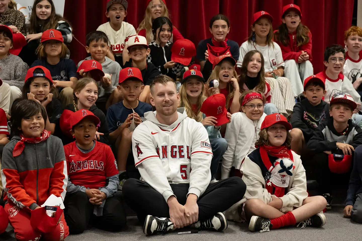 Zeferjahn and McDaniels connect with elementary students in community outreach initiative.