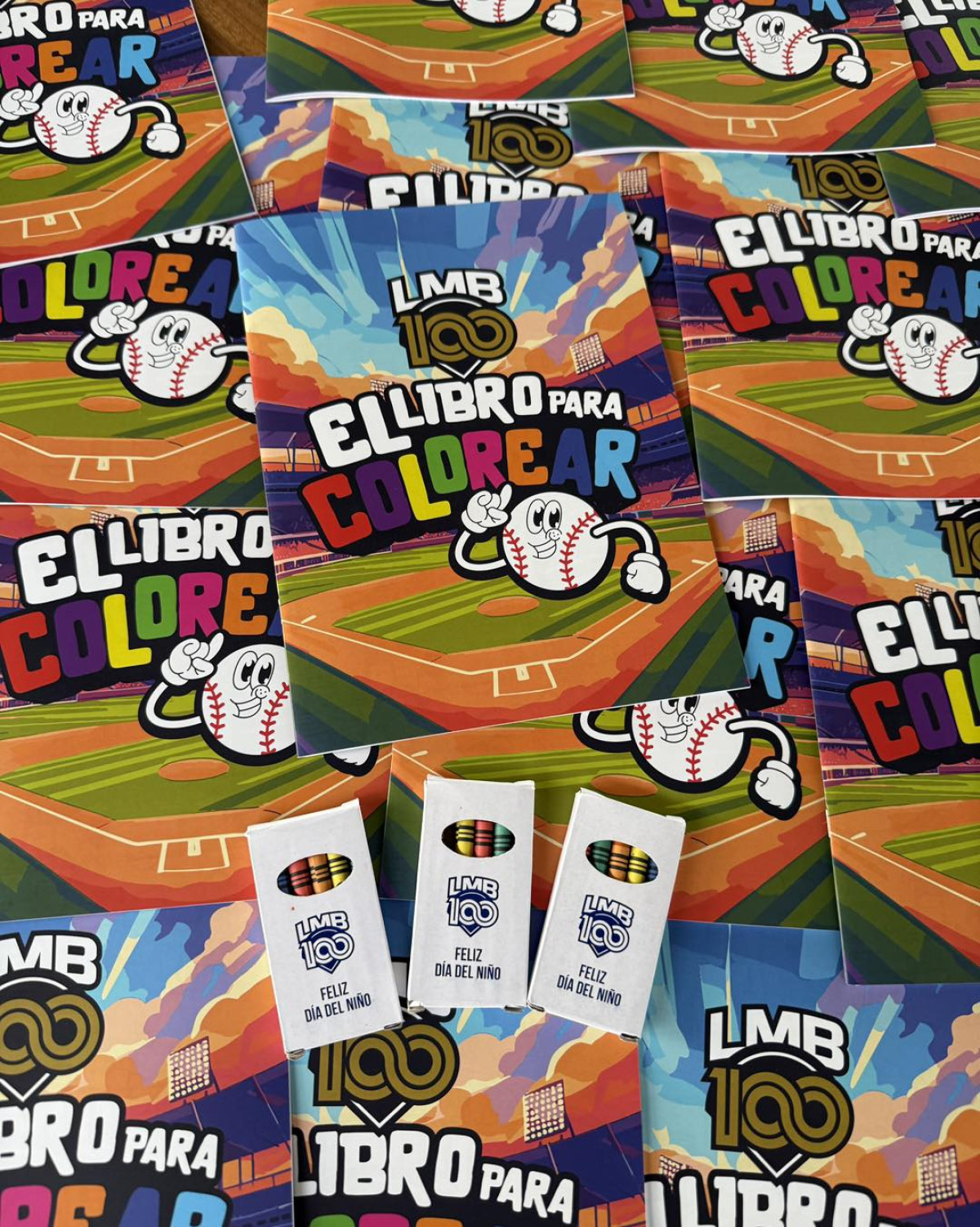 A fun-filled event at Estadio Sherwin-Williams Beto Ávila, where kids enjoy book giveaways.